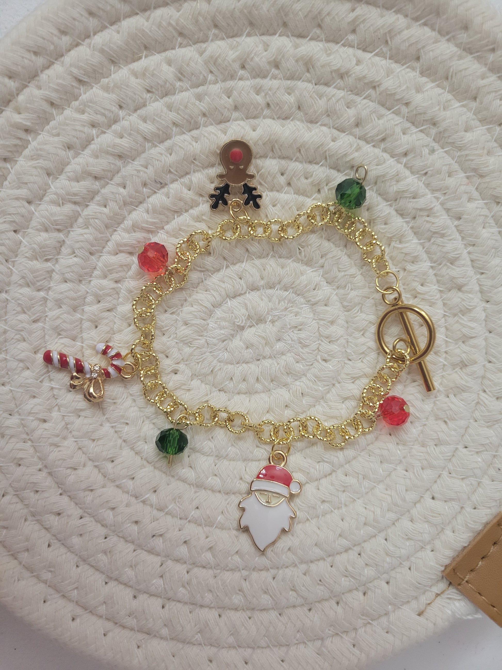 Pulsera de charms navideños