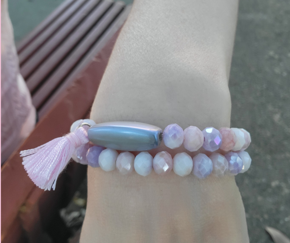 Set de dos pulseras de cuentas facetas con una borla